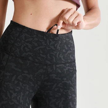 SYROKAN Femei Goale Sentiment de Înaltă Talie Pantaloni de Antrenament Yoga Jambiere Capri cu Buzunare Laterale -23 cm